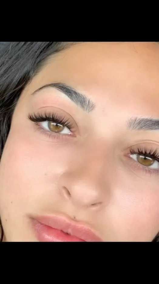 Full face — dark hair, volume lash result both eyes
